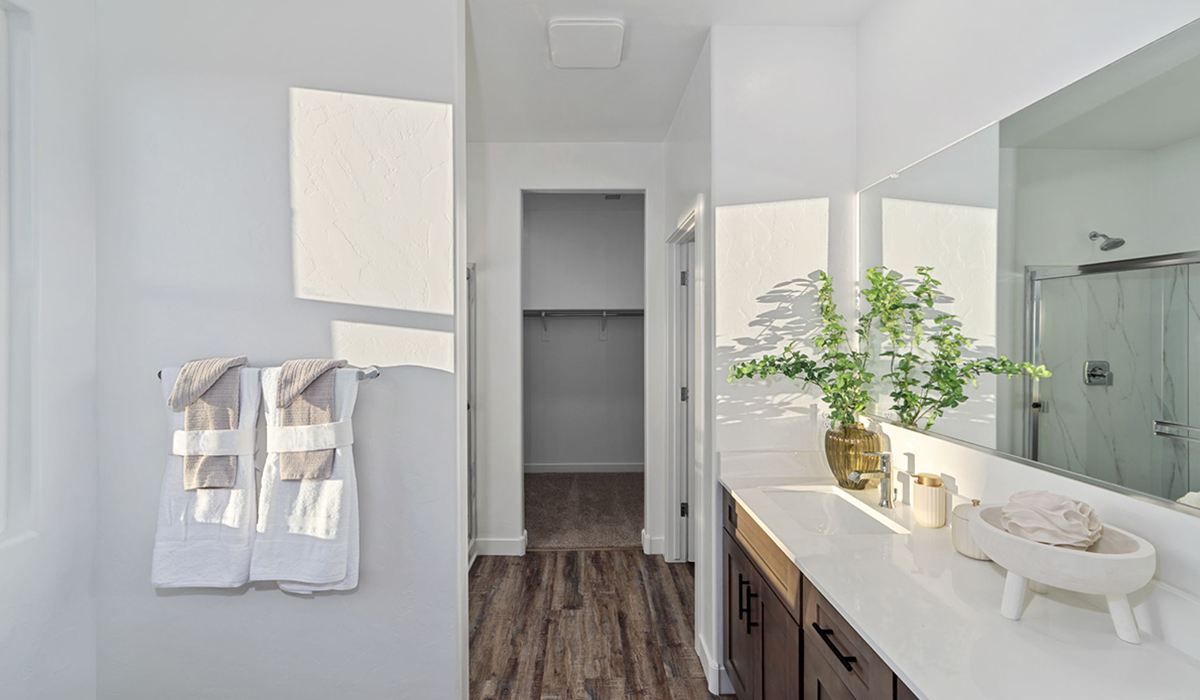 Introducing the Mariposa at Entrada Del Toro, a stunning single-story home within the master-planned community of Rancho Sahuarita.  This spacious and inviting home offers 1,897 sq. ft., four bedrooms, three full bathrooms, covered back patio, and two-car garage. This impressive layout is ideal for large households, multigenerational living, or anyone who simply wants room to grow, gather, and live comfortably.  A welcoming front porch leads you into the entryway, which flows into the expansive open-concept great room, dining area, and kitchen. The kitchen features a large center island, Shaker-style cabinetry, and plenty of storage space. With thoughtful design and abundant natural light this home welcoming.  One of the standout features of the Mariposa is the second bedroom that features an en-suite bathroom, perfect for multi-generational living, young adult, or a guest-style suite.  Our homes at Entrada Del Toro are designed with the future in mind. Each home features a light lace stucco exterior, landscaped front yards with auto drip irrigation, and large backyards that are fully fenced and ready for your personal touch. Inside, the Home is Connected® Smart Home package brings modern convenience to your fingertips with a smart thermostat, video doorbell, keyless entry, and a Wi-Fi® enabled garage door opener.  With its expansive living spaces, flexible bedroom arrangements, and thoughtful deign throughout, the Mariposa offers the ultimate combination of comfort, convenience, and room to thrive.  Residents of Entrada Del Toro will enjoy access to Rancho Sahuarita’s extensive amenity offerings, which include a full-service fitness center, multiple large swimming pools, pickle-ball courts, splash pads, playgrounds, and sizable parks and recreational spaces designed for all ages and lifestyles. In addition, homeowners will have exclusive access to the brand-new Entrada Del Toro Community Center, scheduled to open Spring 2026, further enhancing the neighborhood experience with modern gathering and recreational spaces close to home.  *Images shown are for reference only. They depict the Mariposa model home and may not represent the actual home.