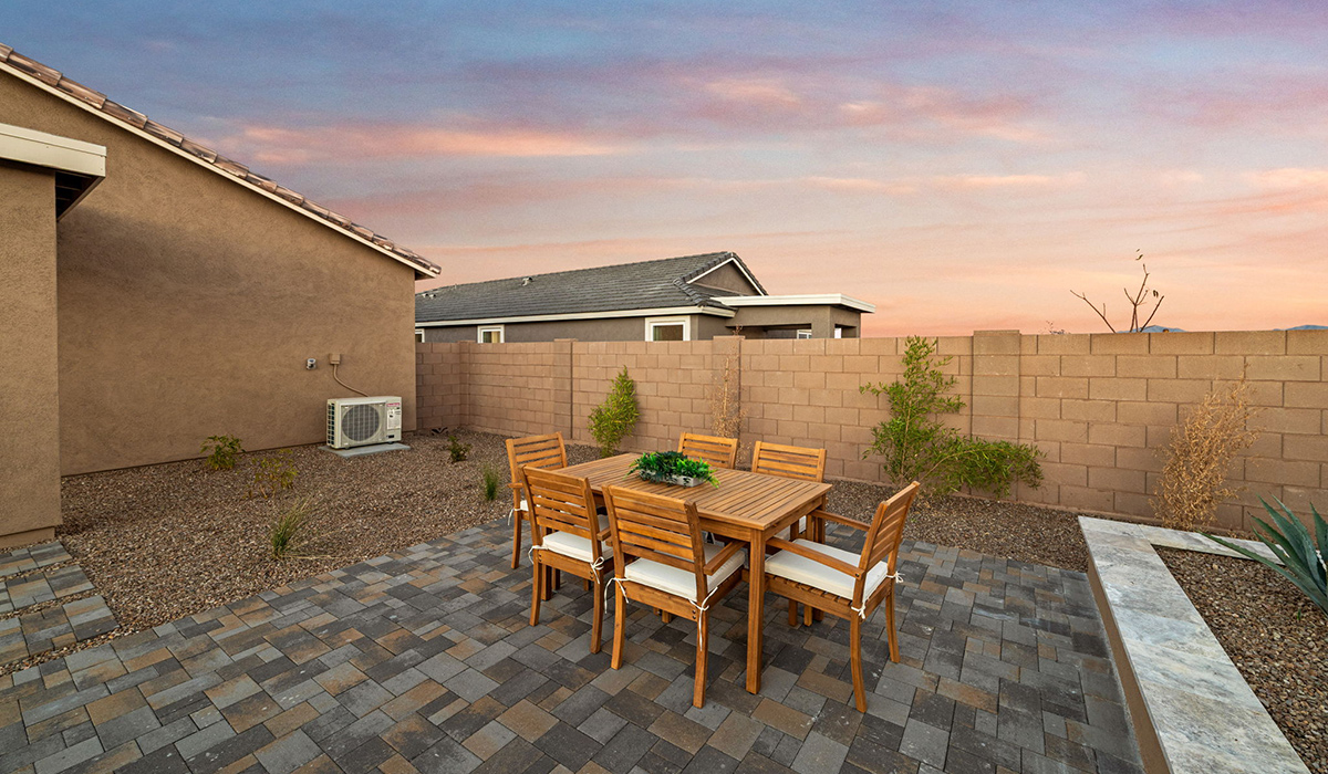 Introducing the Mariposa at Entrada Del Toro, a stunning single-story home within the master-planned community of Rancho Sahuarita.  This spacious and inviting home offers 1,897 sq. ft., four bedrooms, three full bathrooms, covered back patio, and two-car garage. This impressive layout is ideal for large households, multigenerational living, or anyone who simply wants room to grow, gather, and live comfortably.  A welcoming front porch leads you into the entryway, which flows into the expansive open-concept great room, dining area, and kitchen. The kitchen features a large center island, Shaker-style cabinetry, and plenty of storage space. With thoughtful design and abundant natural light this home welcoming.  One of the standout features of the Mariposa is the second bedroom that features an en-suite bathroom, perfect for multi-generational living, young adult, or a guest-style suite.  Our homes at Entrada Del Toro are designed with the future in mind. Each home features a light lace stucco exterior, landscaped front yards with auto drip irrigation, and large backyards that are fully fenced and ready for your personal touch. Inside, the Home is Connected® Smart Home package brings modern convenience to your fingertips with a smart thermostat, video doorbell, keyless entry, and a Wi-Fi® enabled garage door opener.  With its expansive living spaces, flexible bedroom arrangements, and thoughtful deign throughout, the Mariposa offers the ultimate combination of comfort, convenience, and room to thrive.  Residents of Entrada Del Toro will enjoy access to Rancho Sahuarita’s extensive amenity offerings, which include a full-service fitness center, multiple large swimming pools, pickle-ball courts, splash pads, playgrounds, and sizable parks and recreational spaces designed for all ages and lifestyles. In addition, homeowners will have exclusive access to the brand-new Entrada Del Toro Community Center, scheduled to open Spring 2026, further enhancing the neighborhood experience with modern gathering and recreational spaces close to home.  *Images shown are for reference only. They depict The Mariposa sales model home and may not represent the actual home.