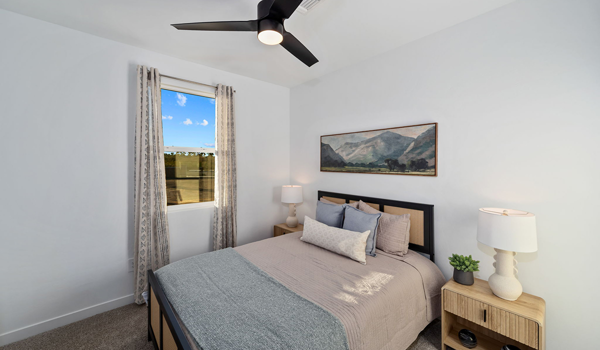 Introducing the Mariposa at Entrada Del Toro, a stunning single-story home within the master-planned community of Rancho Sahuarita.  This spacious and inviting home offers 1,897 sq. ft., four bedrooms, three full bathrooms, covered back patio, and two-car garage. This impressive layout is ideal for large households, multigenerational living, or anyone who simply wants room to grow, gather, and live comfortably.  A welcoming front porch leads you into the entryway, which flows into the expansive open-concept great room, dining area, and kitchen. The kitchen features a large center island, Shaker-style cabinetry, and plenty of storage space. With thoughtful design and abundant natural light this home welcoming.  One of the standout features of the Mariposa is the second bedroom that features an en-suite bathroom, perfect for multi-generational living, young adult, or a guest-style suite.  Our homes at Entrada Del Toro are designed with the future in mind. Each home features a light lace stucco exterior, landscaped front yards with auto drip irrigation, and large backyards that are fully fenced and ready for your personal touch. Inside, the Home is Connected® Smart Home package brings modern convenience to your fingertips with a smart thermostat, video doorbell, keyless entry, and a Wi-Fi® enabled garage door opener.  With its expansive living spaces, flexible bedroom arrangements, and thoughtful deign throughout, the Mariposa offers the ultimate combination of comfort, convenience, and room to thrive.  Residents of Entrada Del Toro will enjoy access to Rancho Sahuarita’s extensive amenity offerings, which include a full-service fitness center, multiple large swimming pools, pickle-ball courts, splash pads, playgrounds, and sizable parks and recreational spaces designed for all ages and lifestyles. In addition, homeowners will have exclusive access to the brand-new Entrada Del Toro Community Center, scheduled to open Spring 2026, further enhancing the neighborhood experience with modern gathering and recreational spaces close to home.