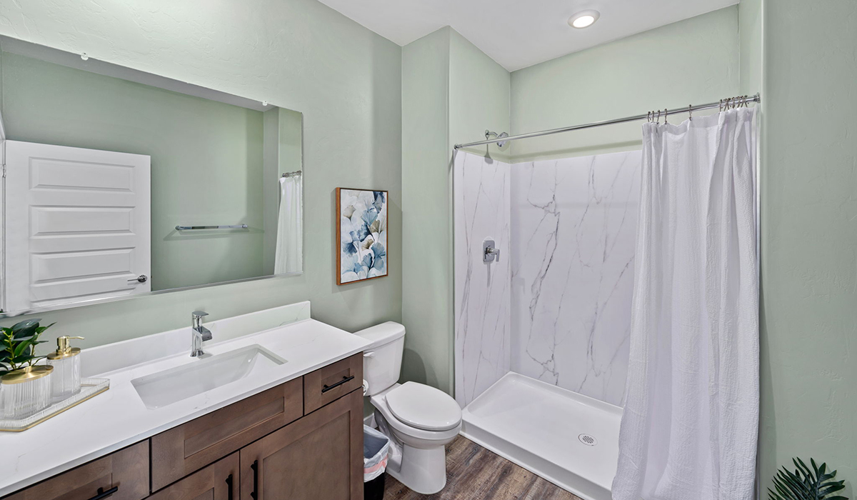 Introducing the Mariposa at Entrada Del Toro, a stunning single-story home within the master-planned community of Rancho Sahuarita.  This spacious and inviting home offers 1,897 sq. ft., four bedrooms, three full bathrooms, covered back patio, and two-car garage. This impressive layout is ideal for large households, multigenerational living, or anyone who simply wants room to grow, gather, and live comfortably.  A welcoming front porch leads you into the entryway, which flows into the expansive open-concept great room, dining area, and kitchen. The kitchen features a large center island, Shaker-style cabinetry, and plenty of storage space. With thoughtful design and abundant natural light this home welcoming.  One of the standout features of the Mariposa is the second bedroom that features an en-suite bathroom, perfect for multi-generational living, young adult, or a guest-style suite.  Our homes at Entrada Del Toro are designed with the future in mind. Each home features a light lace stucco exterior, landscaped front yards with auto drip irrigation, and large backyards that are fully fenced and ready for your personal touch. Inside, the Home is Connected® Smart Home package brings modern convenience to your fingertips with a smart thermostat, video doorbell, keyless entry, and a Wi-Fi® enabled garage door opener.  With its expansive living spaces, flexible bedroom arrangements, and thoughtful deign throughout, the Mariposa offers the ultimate combination of comfort, convenience, and room to thrive.  Residents of Entrada Del Toro will enjoy access to Rancho Sahuarita’s extensive amenity offerings, which include a full-service fitness center, multiple large swimming pools, pickle-ball courts, splash pads, playgrounds, and sizable parks and recreational spaces designed for all ages and lifestyles. In addition, homeowners will have exclusive access to the brand-new Entrada Del Toro Community Center, scheduled to open Spring 2026, further enhancing the neighborhood experience with modern gathering and recreational spaces close to home.  *Images shown are for reference only. They depict the Mariposa sales model home and may not represent the actual home.