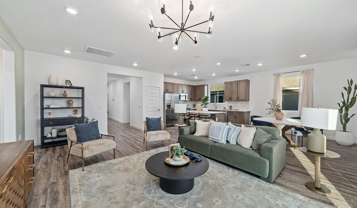 Introducing the Mariposa at Entrada Del Toro, a stunning single-story home within the master-planned community of Rancho Sahuarita.  This spacious and inviting home offers 1,897 sq. ft., four bedrooms, three full bathrooms, covered back patio, and two-car garage. This impressive layout is ideal for large households, multigenerational living, or anyone who simply wants room to grow, gather, and live comfortably.  A welcoming front porch leads you into the entryway, which flows into the expansive open-concept great room, dining area, and kitchen. The kitchen features a large center island, Shaker-style cabinetry, and plenty of storage space. With thoughtful design and abundant natural light this home welcoming.  One of the standout features of the Mariposa is the second bedroom that features an en-suite bathroom, perfect for multi-generational living, young adult, or a guest-style suite.  Our homes at Entrada Del Toro are designed with the future in mind. Each home features a light lace stucco exterior, landscaped front yards with auto drip irrigation, and large backyards that are fully fenced and ready for your personal touch. Inside, the Home is Connected® Smart Home package brings modern convenience to your fingertips with a smart thermostat, video doorbell, keyless entry, and a Wi-Fi® enabled garage door opener.  With its expansive living spaces, flexible bedroom arrangements, and thoughtful deign throughout, the Mariposa offers the ultimate combination of comfort, convenience, and room to thrive.  Residents of Entrada Del Toro will enjoy access to Rancho Sahuarita’s extensive amenity offerings, which include a full-service fitness center, multiple large swimming pools, pickle-ball courts, splash pads, playgrounds, and sizable parks and recreational spaces designed for all ages and lifestyles. In addition, homeowners will have exclusive access to the brand-new Entrada Del Toro Community Center, scheduled to open Spring 2026, further enhancing the neighborhood experience with modern gathering and recreational spaces close to home.