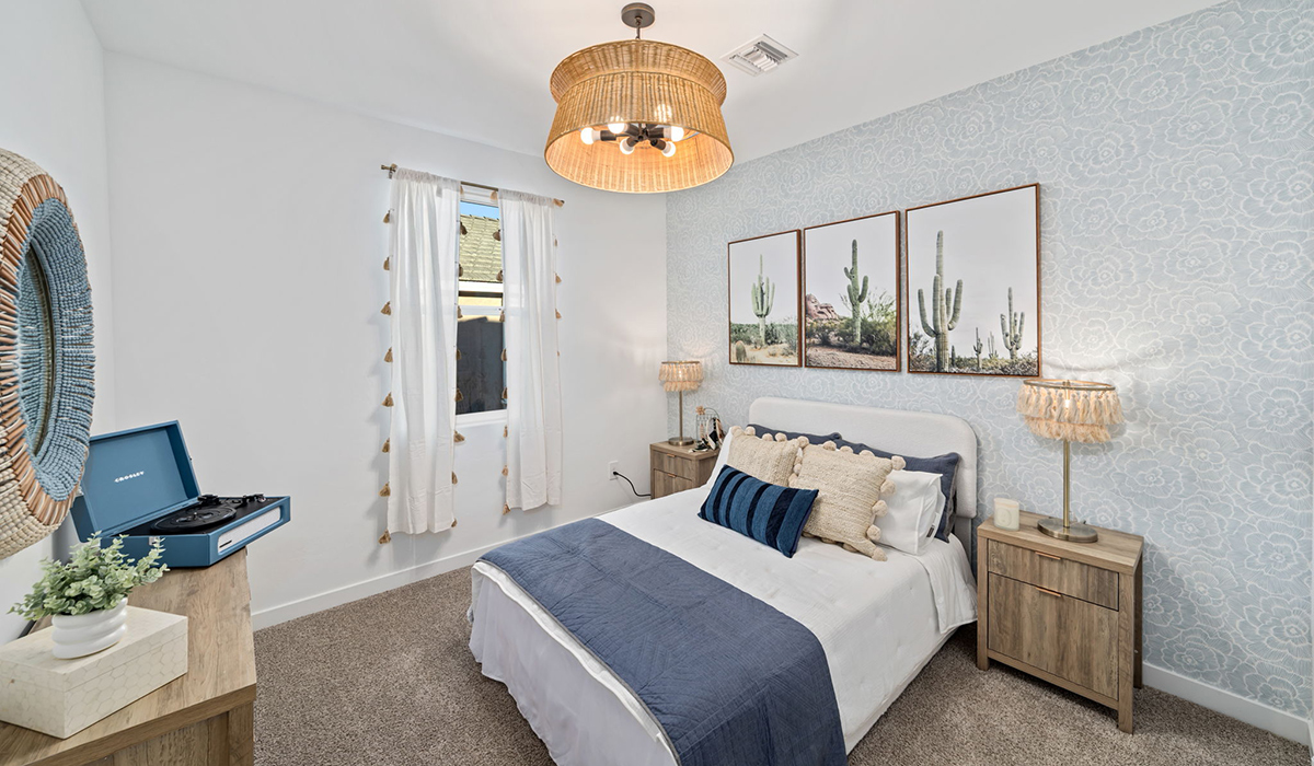 Introducing the Mariposa at Entrada Del Toro, a stunning single-story home within the master-planned community of Rancho Sahuarita.  This spacious and inviting home offers 1,897 sq. ft., four bedrooms, three full bathrooms, covered back patio, and two-car garage. This impressive layout is ideal for large households, multigenerational living, or anyone who simply wants room to grow, gather, and live comfortably.  A welcoming front porch leads you into the entryway, which flows into the expansive open-concept great room, dining area, and kitchen. The kitchen features a large center island, Shaker-style cabinetry, and plenty of storage space. With thoughtful design and abundant natural light this home welcoming.  One of the standout features of the Mariposa is the second bedroom that features an en-suite bathroom, perfect for multi-generational living, young adult, or a guest-style suite.  Our homes at Entrada Del Toro are designed with the future in mind. Each home features a light lace stucco exterior, landscaped front yards with auto drip irrigation, and large backyards that are fully fenced and ready for your personal touch. Inside, the Home is Connected® Smart Home package brings modern convenience to your fingertips with a smart thermostat, video doorbell, keyless entry, and a Wi-Fi® enabled garage door opener.  With its expansive living spaces, flexible bedroom arrangements, and thoughtful deign throughout, the Mariposa offers the ultimate combination of comfort, convenience, and room to thrive.  Residents of Entrada Del Toro will enjoy access to Rancho Sahuarita’s extensive amenity offerings, which include a full-service fitness center, multiple large swimming pools, pickle-ball courts, splash pads, playgrounds, and sizable parks and recreational spaces designed for all ages and lifestyles. In addition, homeowners will have exclusive access to the brand-new Entrada Del Toro Community Center, scheduled to open Spring 2026, further enhancing the neighborhood experience with modern gathering and recreational spaces close to home.