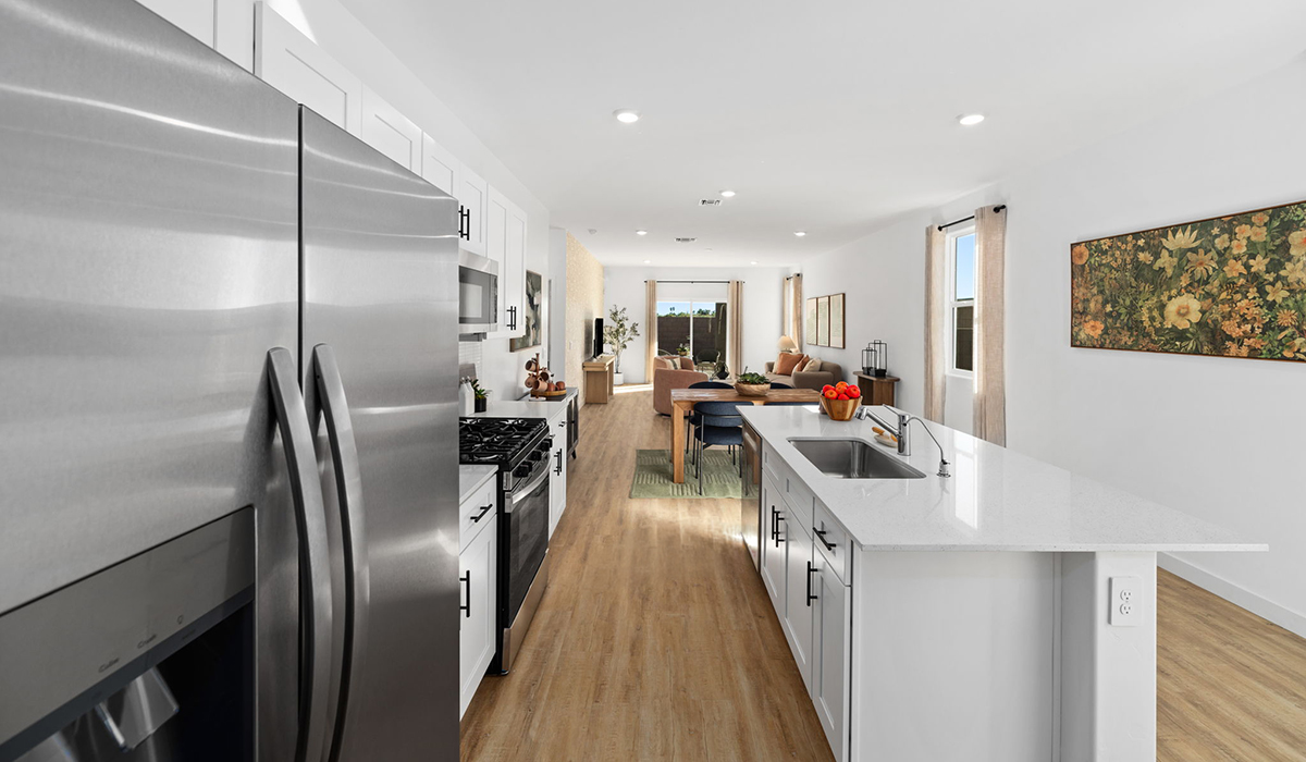 Introducing the Carolina — a thoughtfully designed single-story home offering 1,608 sq. ft. of modern comfort at Entrada Del Toro, a master-planned community in Rancho Sahuarita.  With three bedrooms, two full bathrooms, and a two-car garage, this efficient and beautifully planned layout is perfect for those seeking convenience, comfort, and single-level living.  A welcoming front porch invites you inside, where the entryway opens into a bright and beautifully crafted living space. The heart of the home is the well-appointed kitchen, featuring a large center island, walk-in pantry, and stylish Shaker-style cabinetry. Overlooking the dining area and great room, this open layout makes it easy to cook, gather, and entertain with ease.  The primary bedroom is thoughtfully positioned at the rear of the home, creating a private retreat. Complete with a large en-suite bathroom and walk-in closet, it’s designed for relaxation and convenience.  Two additional bedrooms are located toward the front of the home, offering flexibility for family, guests, a home office, or hobbies, and share a full secondary hallway bathroom.  Our homes at Entrada Del Toro are designed with the future in mind. Each home features a light lace stucco exterior, landscaped front yards with auto drip irrigation, and large backyards that are fully fenced and ready for your personal touch. Inside, the Home is Connected® Smart Home package brings modern convenience to your fingertips with a smart thermostat, video doorbell, keyless entry, and a Wi-Fi® enabled garage door opener.  With its smart layout, modern features, and effortless single-story living, the Carolina brings comfort and functionality together in a one beautifully designed home here at Entrada Del Toro.  Residents of Entrada Del Toro will enjoy access to Rancho Sahuarita’s extensive amenity offerings, which include a full-service fitness center, multiple large swimming pools, pickle-ball courts, splash pads, playgrounds, and sizable parks and recreational spaces designed for all ages and lifestyles. In addition, homeowners will have exclusive access to the brand-new Entrada Del Toro Community Center, scheduled to open Spring 2026, further enhancing the neighborhood experience with modern gathering and recreational spaces close to home.