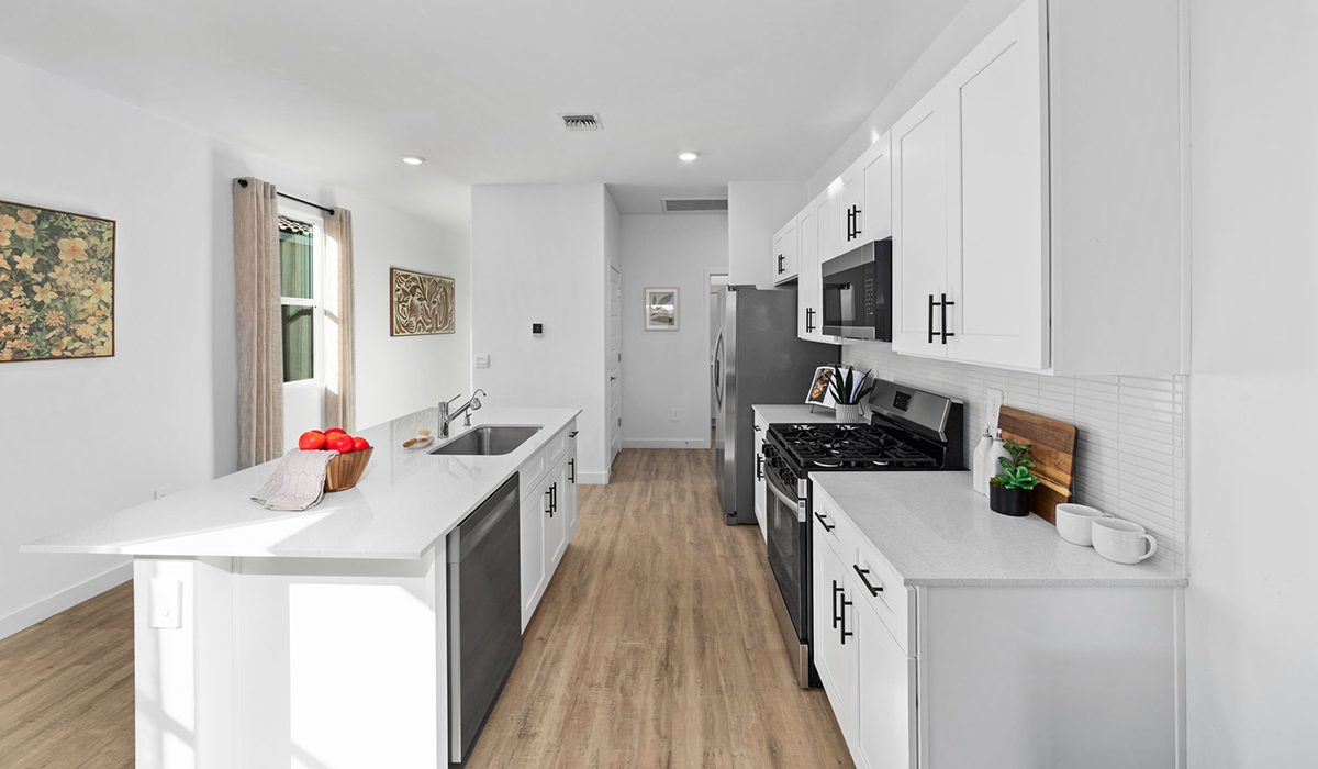 Introducing the Carolina — a thoughtfully designed single-story home offering 1,608 sq. ft. of modern comfort at Entrada Del Toro, a master-planned community in Rancho Sahuarita.  With three bedrooms, two full bathrooms, and a two-car garage, this efficient and beautifully planned layout is perfect for those seeking convenience, comfort, and single-level living.  A welcoming front porch invites you inside, where the entryway opens into a bright and beautifully crafted living space. The heart of the home is the well-appointed kitchen, featuring a large center island, walk-in pantry, and stylish Shaker-style cabinetry. Overlooking the dining area and great room, this open layout makes it easy to cook, gather, and entertain with ease.  The primary bedroom is thoughtfully positioned at the rear of the home, creating a private retreat. Complete with a large en-suite bathroom and walk-in closet, it’s designed for relaxation and convenience.  Two additional bedrooms are located toward the front of the home, offering flexibility for family, guests, a home office, or hobbies, and share a full secondary hallway bathroom.  Our homes at Entrada Del Toro are designed with the future in mind. Each home features a light lace stucco exterior, landscaped front yards with auto drip irrigation, and large backyards that are fully fenced and ready for your personal touch. Inside, the Home is Connected® Smart Home package brings modern convenience to your fingertips with a smart thermostat, video doorbell, keyless entry, and a Wi-Fi® enabled garage door opener.  With its smart layout, modern features, and effortless single-story living, the Carolina brings comfort and functionality together in a one beautifully designed home here at Entrada Del Toro.  Residents of Entrada Del Toro will enjoy access to Rancho Sahuarita’s extensive amenity offerings, which include a full-service fitness center, multiple large swimming pools, pickle-ball courts, splash pads, playgrounds, and sizable parks and recreational spaces designed for all ages and lifestyles. In addition, homeowners will have exclusive access to the brand-new Entrada Del Toro Community Center, scheduled to open Spring 2026, further enhancing the neighborhood experience with modern gathering and recreational spaces close to home.