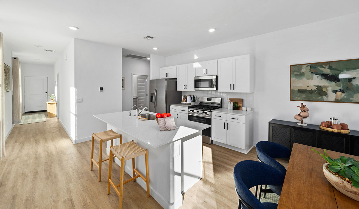 Introducing the Carolina — a thoughtfully designed single-story home offering 1,608 sq. ft. of modern comfort at Entrada Del Toro, a master-planned community in Rancho Sahuarita.  With three bedrooms, two full bathrooms, and a two-car garage, this efficient and beautifully planned layout is perfect for those seeking convenience, comfort, and single-level living.  A welcoming front porch invites you inside, where the entryway opens into a bright and beautifully crafted living space. The heart of the home is the well-appointed kitchen, featuring a large center island, walk-in pantry, and stylish Shaker-style cabinetry. Overlooking the dining area and great room, this open layout makes it easy to cook, gather, and entertain with ease.  The primary bedroom is thoughtfully positioned at the rear of the home, creating a private retreat. Complete with a large en-suite bathroom and walk-in closet, it’s designed for relaxation and convenience.  Two additional bedrooms are located toward the front of the home, offering flexibility for family, guests, a home office, or hobbies, and share a full secondary hallway bathroom.  Our homes at Entrada Del Toro are designed with the future in mind. Each home features a light lace stucco exterior, landscaped front yards with auto drip irrigation, and large backyards that are fully fenced and ready for your personal touch. Inside, the Home is Connected® Smart Home package brings modern convenience to your fingertips with a smart thermostat, video doorbell, keyless entry, and a Wi-Fi® enabled garage door opener.  With its smart layout, modern features, and effortless single-story living, the Carolina brings comfort and functionality together in a one beautifully designed home here at Entrada Del Toro.  Residents of Entrada Del Toro will enjoy access to Rancho Sahuarita’s extensive amenity offerings, which include a full-service fitness center, multiple large swimming pools, pickle-ball courts, splash pads, playgrounds, and sizable parks and recreational spaces designed for all ages and lifestyles. In addition, homeowners will have exclusive access to the brand-new Entrada Del Toro Community Center, scheduled to open Spring 2026, further enhancing the neighborhood experience with modern gathering and recreational spaces close to home.