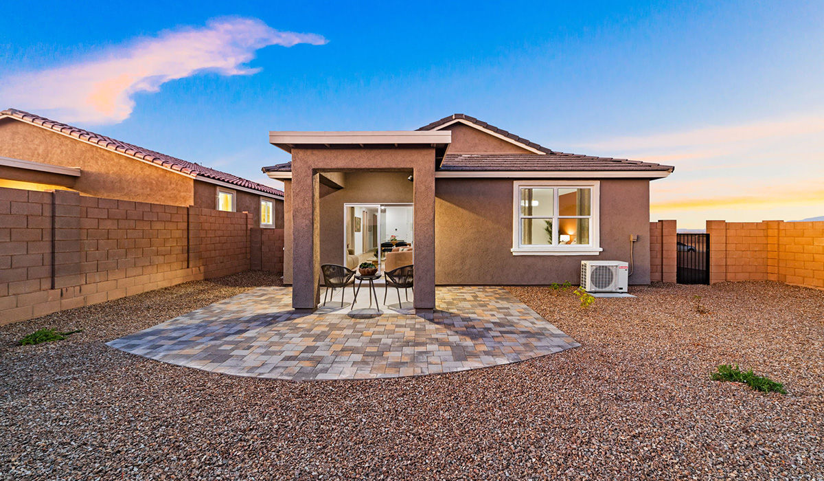Introducing the Carolina — a thoughtfully designed single-story home offering 1,608 sq. ft. of modern comfort at Entrada Del Toro, a master-planned community in Rancho Sahuarita.  With three bedrooms, two full bathrooms, and a two-car garage, this efficient and beautifully planned layout is perfect for those seeking convenience, comfort, and single-level living.  A welcoming front porch invites you inside, where the entryway opens into a bright and beautifully crafted living space. The heart of the home is the well-appointed kitchen, featuring a large center island, walk-in pantry, and stylish Shaker-style cabinetry. Overlooking the dining area and great room, this open layout makes it easy to cook, gather, and entertain with ease.  The primary bedroom is thoughtfully positioned at the rear of the home, creating a private retreat. Complete with a large en-suite bathroom and walk-in closet, it’s designed for relaxation and convenience.  Two additional bedrooms are located toward the front of the home, offering flexibility for family, guests, a home office, or hobbies, and share a full secondary hallway bathroom.  Our homes at Entrada Del Toro are designed with the future in mind. Each home features a light lace stucco exterior, landscaped front yards with auto drip irrigation, and large backyards that are fully fenced and ready for your personal touch. Inside, the Home is Connected® Smart Home package brings modern convenience to your fingertips with a smart thermostat, video doorbell, keyless entry, and a Wi-Fi® enabled garage door opener.  With its smart layout, modern features, and effortless single-story living, the Carolina brings comfort and functionality together in a one beautifully designed home here at Entrada Del Toro.  Residents of Entrada Del Toro will enjoy access to Rancho Sahuarita’s extensive amenity offerings, which include a full-service fitness center, multiple large swimming pools, pickle-ball courts, splash pads, playgrounds, and sizable parks and recreational spaces designed for all ages and lifestyles. In addition, homeowners will have exclusive access to the brand-new Entrada Del Toro Community Center, scheduled to open Spring 2026, further enhancing the neighborhood experience with modern gathering and recreational spaces close to home.
