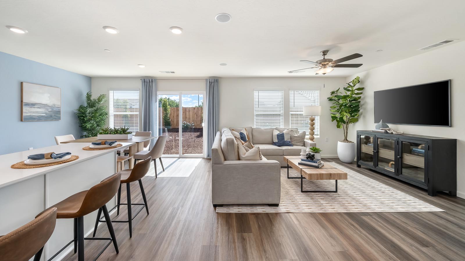 image of great room with kitchen island and living area from home at Juniper Court in Tulare